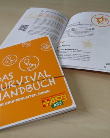 Abbildung des Survivalhandbuchs für Jugendgruppenleiter_innen